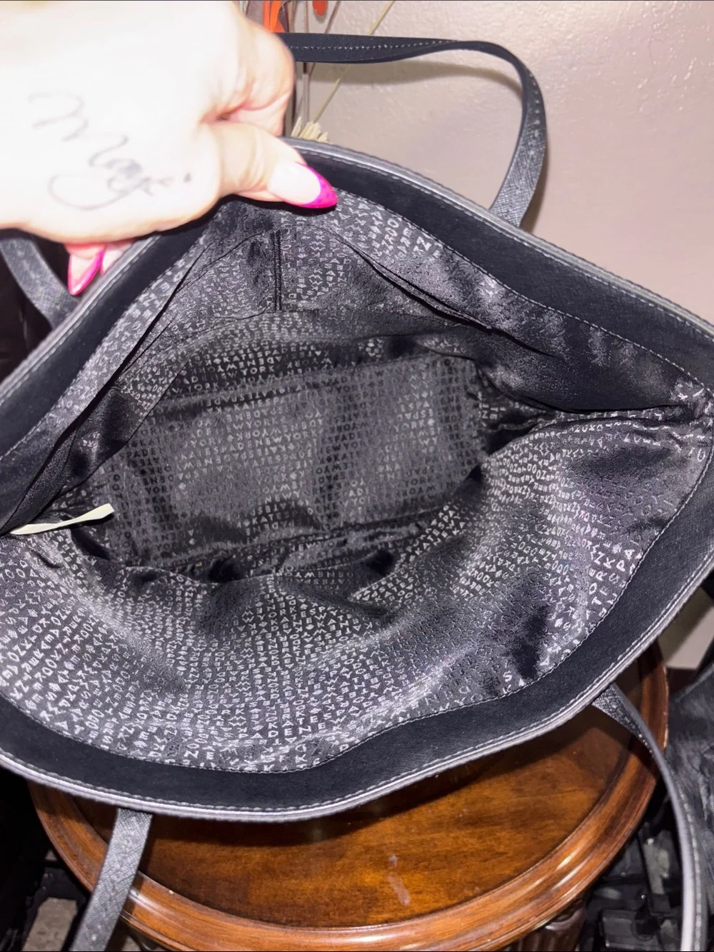 Kate Spade Salinas Tote sequins with a patent leather bow.